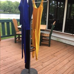 Three one-piece jumpsuits.